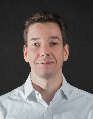 João Moreno, man with short brown hair, slight smile, Executive Director.