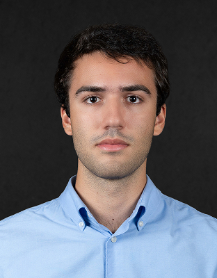Matias Cury, intern, with short dark hair, wearing a blue dress shirt, neutral expression, looking forward.