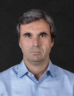 Thiago Sendelbach, man with medium-length dark hair, serious expression, Executive Director.